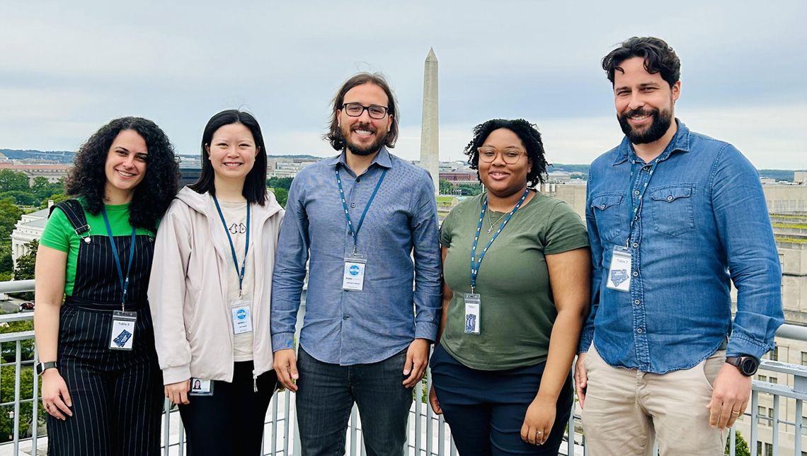 Gazinelli Lab Members standing in front of the Washington Monument
